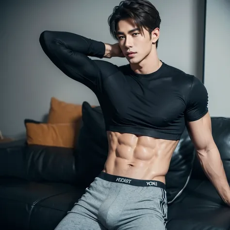 Handsome guy with abs wearing tight pants