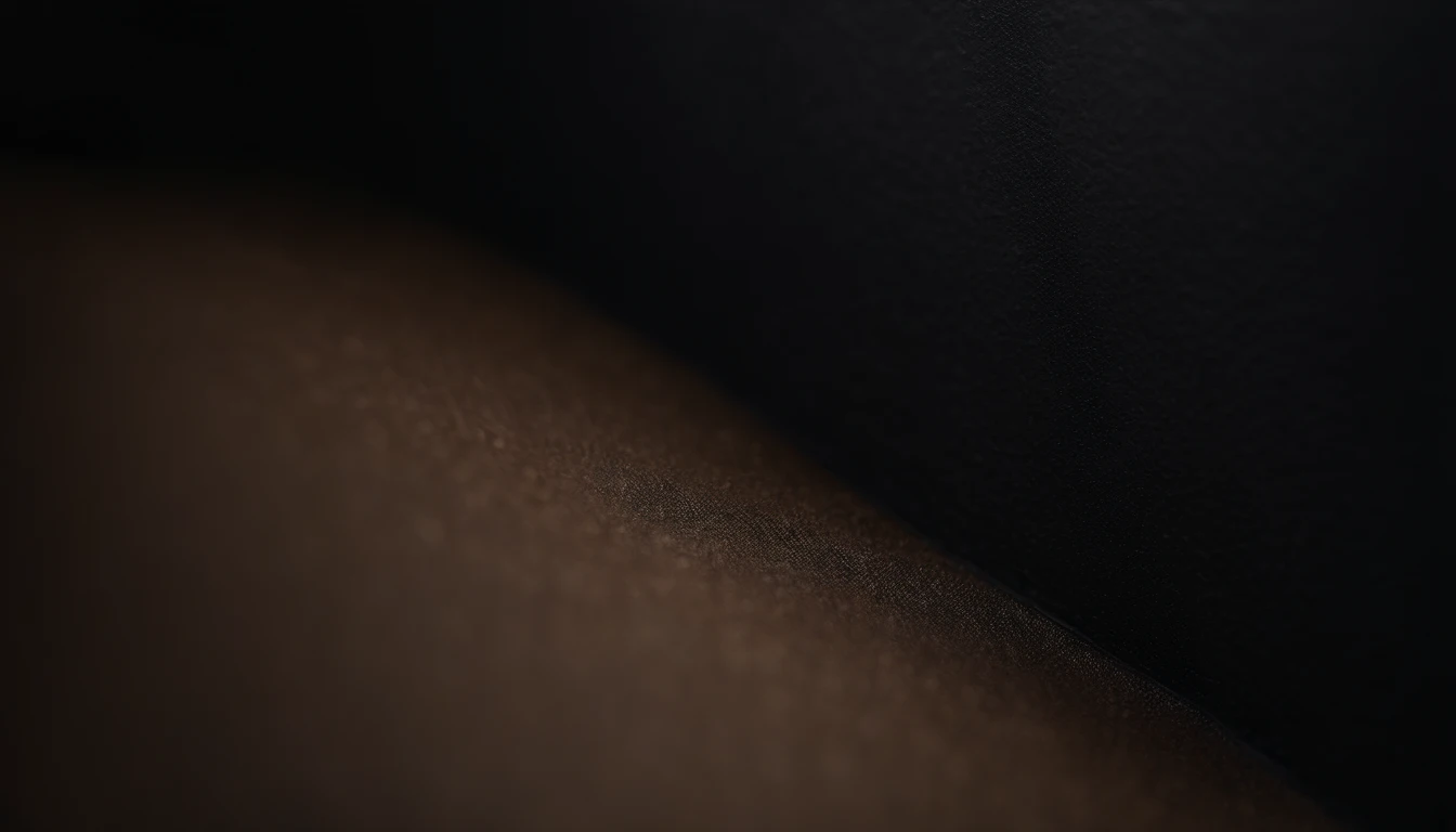 a detailed macro shot of the texture of an empty black wall, focusing on the fine grain and subtle imperfections that give it character and depth