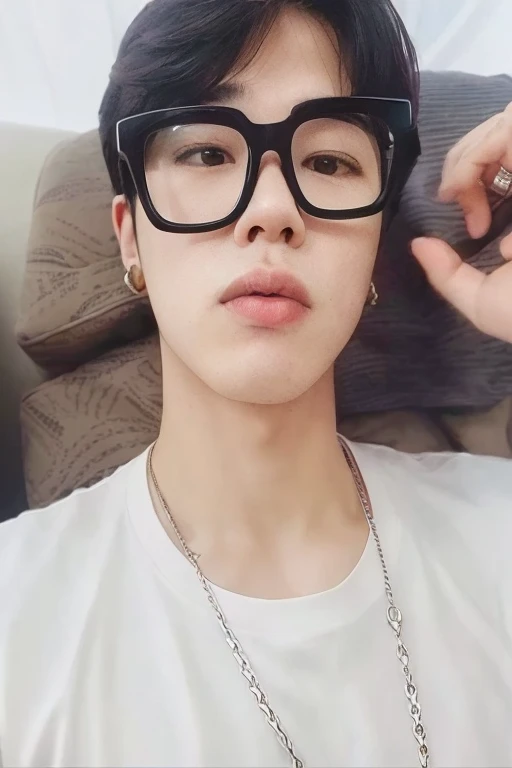 Theres a bespectacled man sitting on a couch, park Jimin, Jiminthe full lips, Jimin, Jimino nariz grego, Jiminthe right eyelid is swollen, Jung Jaehyun, accurate Jimin face, taejune kim, adorable and pale korean face