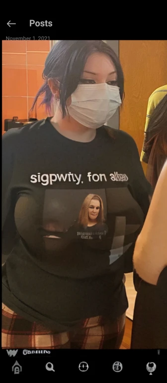 there is a woman wearing a face mask and a shirt, looks like domhnall gleeson, xqc, with the face of emma watson, wearing a t-shirt, very grainy, unknown artist, tommy 1 6 years old, Big tits, huge tits, no clothes, sexy, cute, wide hips, thick thighs, pea...