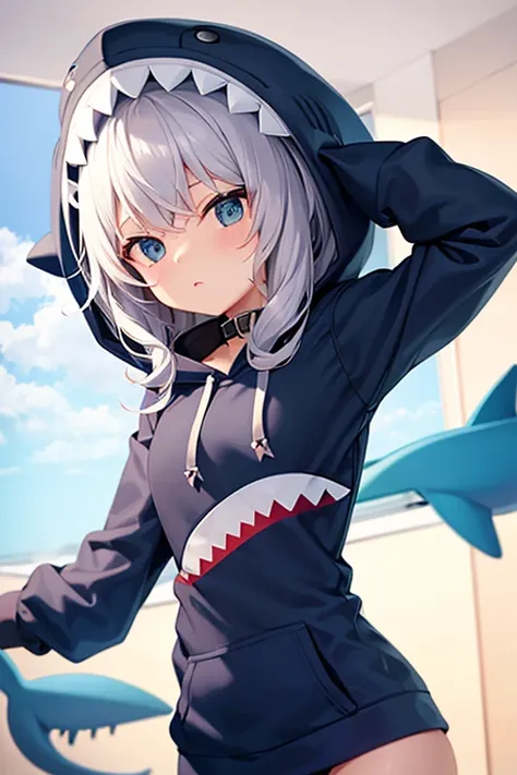 a girl in a shark hoodie