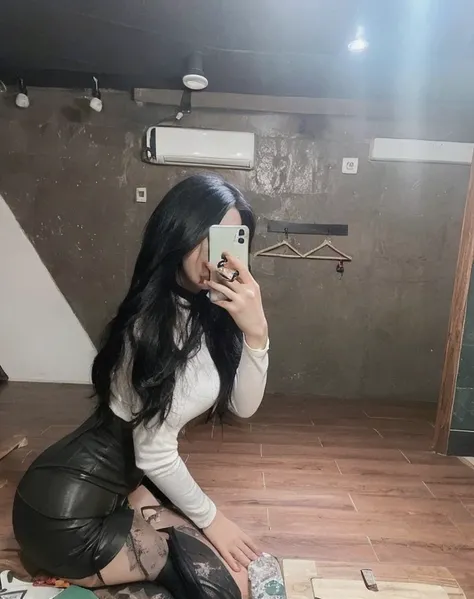 there is a woman sitting on the floor taking a picture of herself, cruel korean goth girl, tight outfit, ulzzang, korean girl, leather body suit, 2 4 year old female model, jinyoung shin, with long dark hair, photo of slim girl, skinny waist and thick hips...