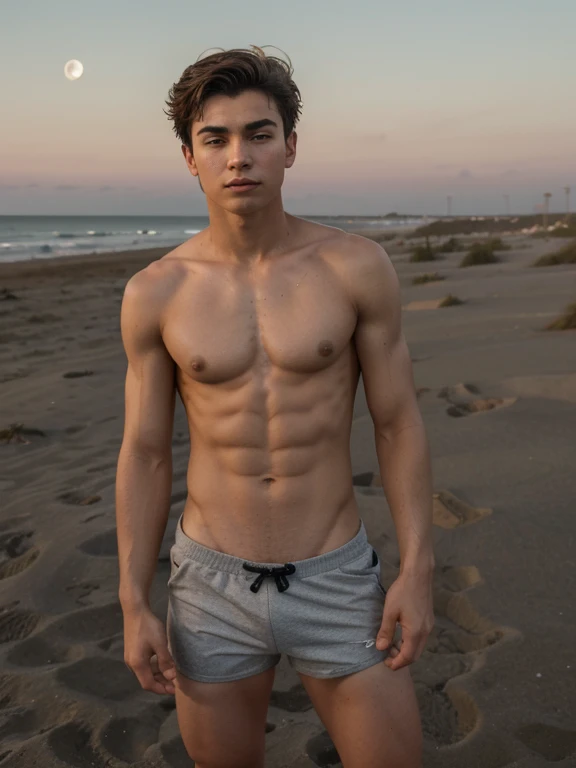 17 year old masculine boy with a very masculine defined body naked in the sand looking at the sky at the moon with his body in the wind a tight short shorts soaked