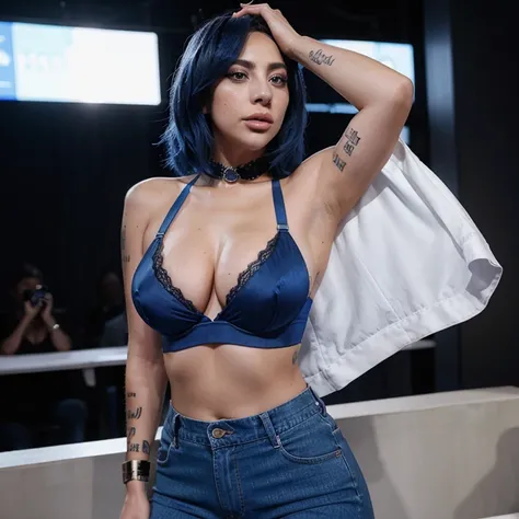 Lady Gaga dressed in a bra and blue pants