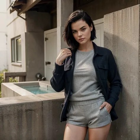 Jaimie Alexander dressed in a wool shirt and shorts