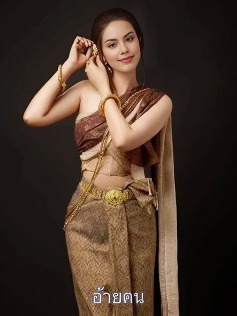 a woman in a traditional outfit posing for a picture, traditional beauty, Sukhothai set, Wear a luxurious tribal outfit., Southeast Asia that has existed for a long time, Wear elegant clothes, traditional clothing, Niwan Chandra, According to Thawan Duchan...