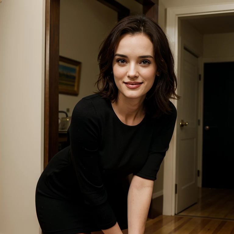 Winona Ryder wearing short tight dress smiling