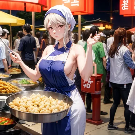 A woman with a towel wrapped around her head making a large amount of tempura at a night market in Korea　highest quality　Wearing an apron