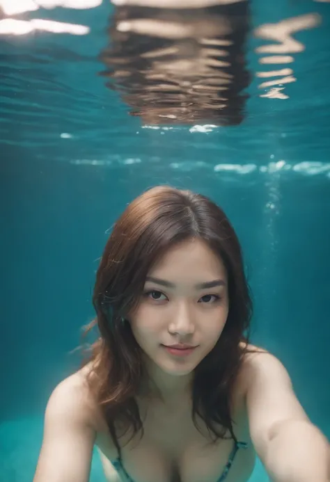 A cute and beautiful Japanese woman in her late twenties with semi-long hair and a voluptuous figure is diving underwater. She is facing the camera with a beaming smile, looking very stylish in a micro bikini. There are many beautiful tropical fish swimmin...