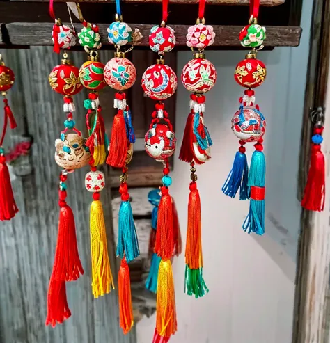 A bunch of ornaments hanging on a key chain, traditional，National trend style, Cute, colorful and adorable, Clay Amulets, DIY, shui mo hua, Inspired by Roma, Chinese style, Chinese, inspired by Luo Ping, Inspired by Pu Hua, Biopunk toys made in China, Chin...