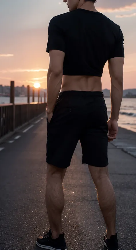 A handsome man under the sunset，Black top，，Short clothes，black trousers，short hair，Side shot from behind，Male Model，