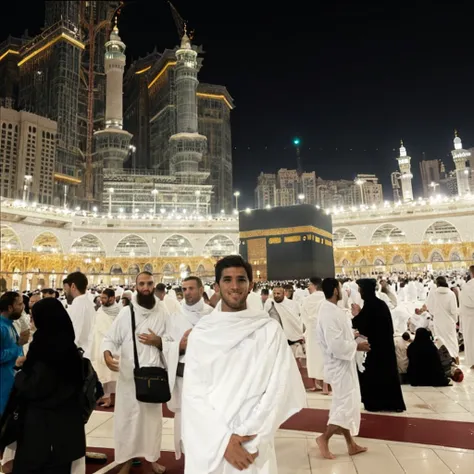 man in front of kaaba mecca wearing ihram clothing