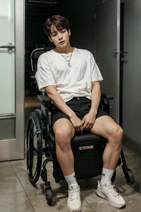 Jungkook BTS sits in a wheelchair with neck and leg support