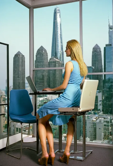 blonde girl, straight hair, blue summerdress, in a office, working on a laptop, city skyline background, looks at laptop, sits on chair, sits in front of laptop, great anatomy, shot with kodak gold 4000