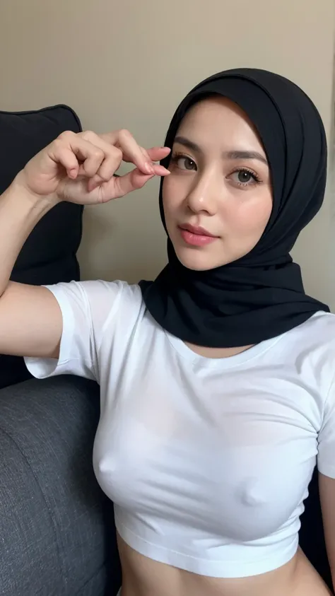 A milf wearing a hijab, Wearing a white t-shirt , in sofa, pose take a selfie