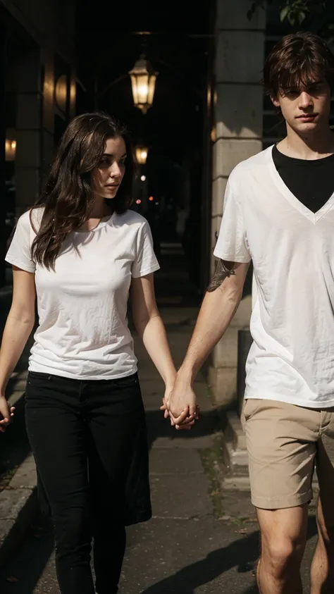 A couple holding hands, the dark girl and the white boy.