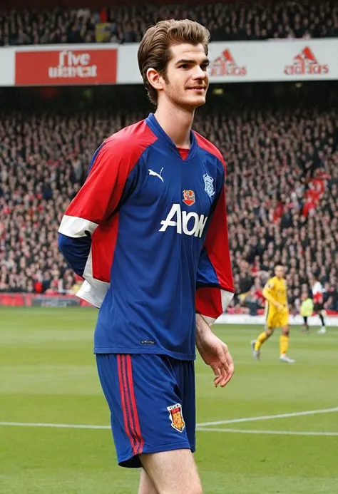 Crie Andrew Garfield, English football player, who plays on the left wing, and who wears shirt number 7,  At the age of 20, the player transferred from Arsenal to Manchester United, also from England in 2003