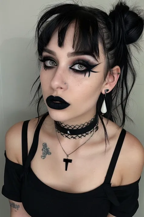 a person with a unique alternative aesthetic. they have dark hair styled with two buns on the top of their head and straight ban...