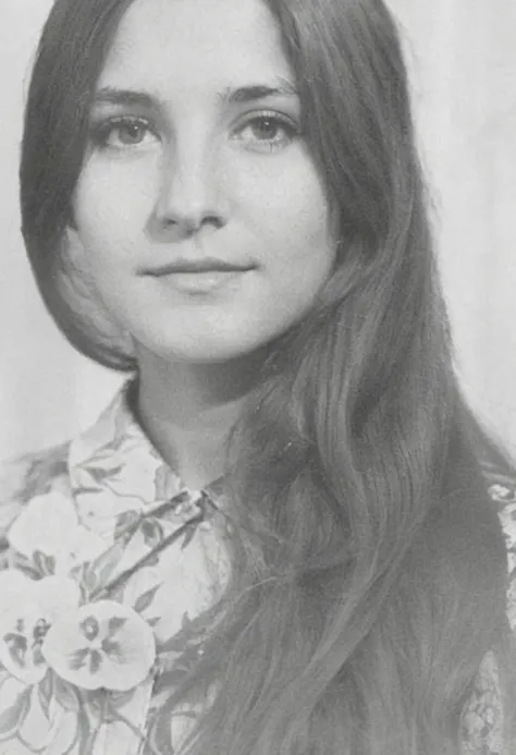 arafed photo of a young woman with long hair and a flower dress, a black and white photograph inspired by Gina Pellón, tumblr, Renaissance, old yearbook photo, in his early 30s, taken in the 1970s, 13 years, in his 20s, taken in the late 1970s