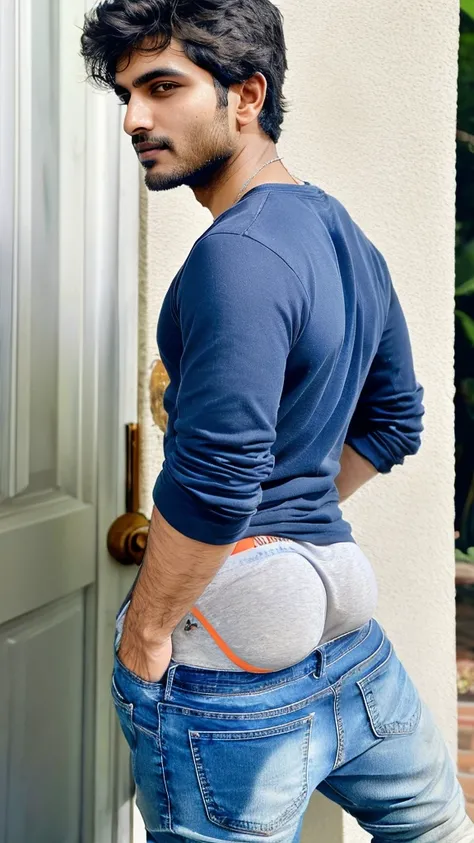 sagging, indian man, jeans, t-shirt, boxers, stubble,( handsome face), detailed eyes, messy hair, cinematic , handsome man,sagback, looking back at me 