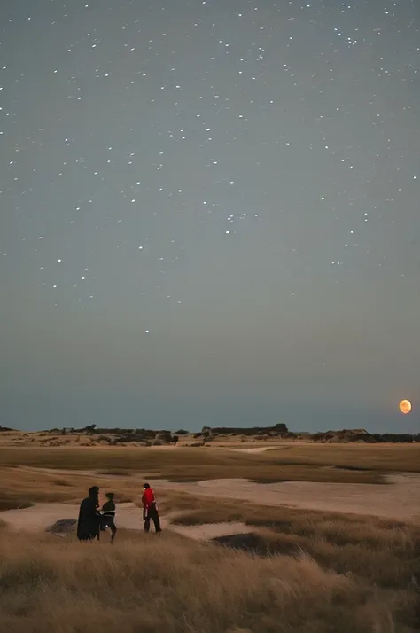 big kingdom, large spotlights, dark skies, red moon