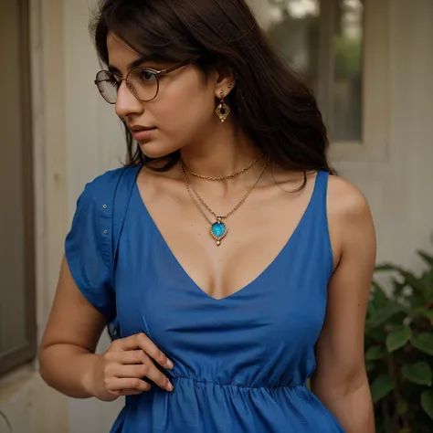 25 years old Pakistani American girl short brown hairs, glasses on wearing blue dress neckless and earrings