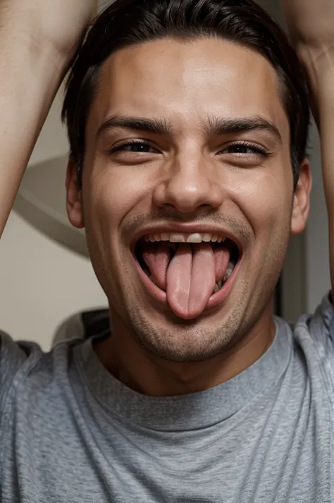 Man with an expression of excitement with his mouth open and tongue out