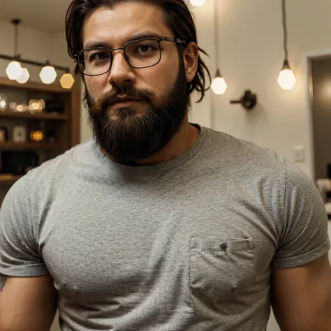 Man with a medium beard and square glasses