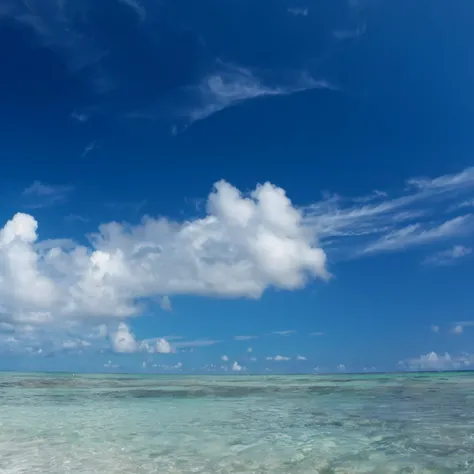 There is a man standing on the beach with a surfboard., sky and Ocean Background, Tropical sea, 澄んだBlue Water, photos of the ocean, Calm sea and beach background, Sea and Sky, Crystal clear sea, blue sea, calm ocean landscape, crystal 澄んだBlue Water, Ocean ...