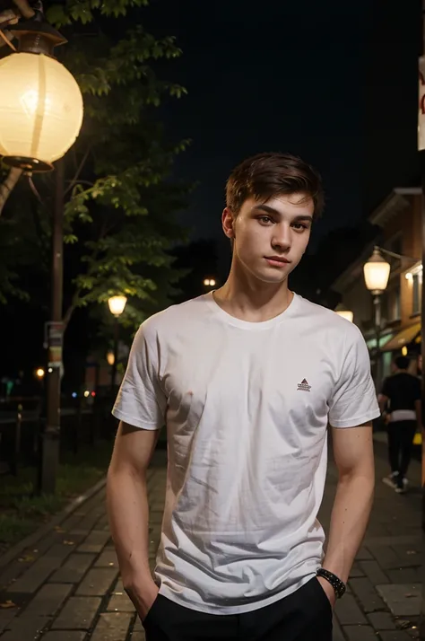 a young man of Slavic appearance, 24 years old, on the street in the evening under the light of lanterns in the city in a white T-shirt