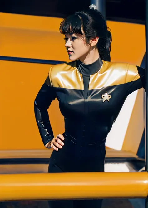 asian woman with curly hair in black and yellow voyunf uniform ,on a starship