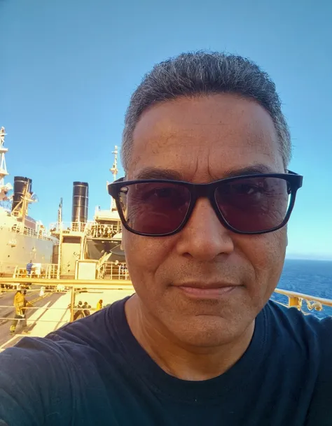 sharp man wearing sunglasses in front of a large ship, em pé on the deck of a ship, 8k selfie shotgraph, standing on the deck of the ship, on the deck of a ship, david rios ferreira, selfie shot, selfie of a man, age 38, pov photo, about 3 5 years old, oce...