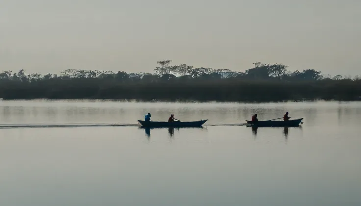 two people in a small boat on a calm lake