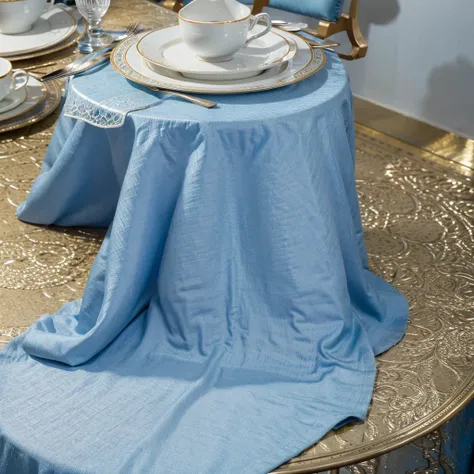 A photorealistic image of a luxuriously set table in a prestigious hotel dining room. The table is covered in a light blue tablecloth that casts a soft, elegant blue tint on the entire scene.  Focus on the intricate details of the table setting, including ...