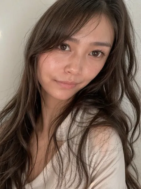 A woman posing for the screen、long brown hair and a white shirt, south east asian round face, without makeup,brightly lit, 30 years old ,wavy hair, taken in the early 2020s, detailed face of a asian girl