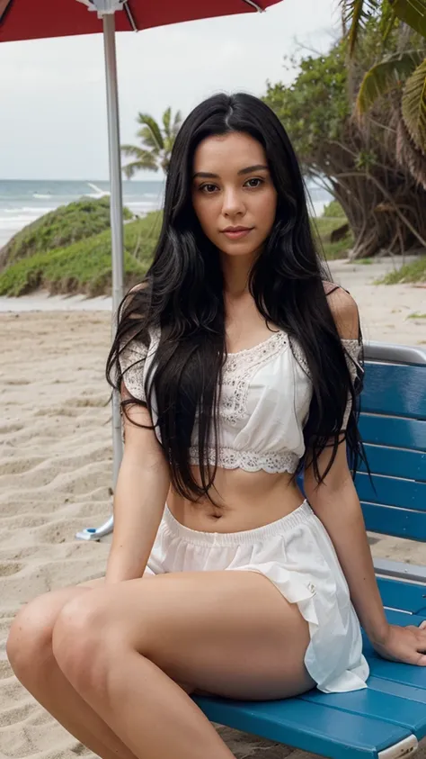 British lady with long black hair sitting at the beach side