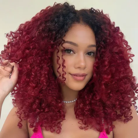 a close up of a woman with red curly hair and a pink top, with curly red hair, red curly hair, curly red hair, red afro, dark red color, curly afro, red wig, maroon red, curly haired, red colored, dark red, curly copper colored hair, curly, afro hair, curl...