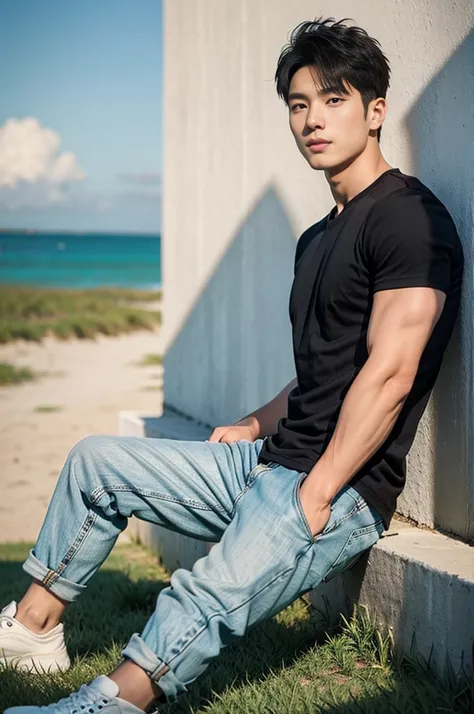 A young Asian man stands, handsome, muscular, looking at the camera. In a simple black t-shirt, Fieldside, grass, beach, sunlight