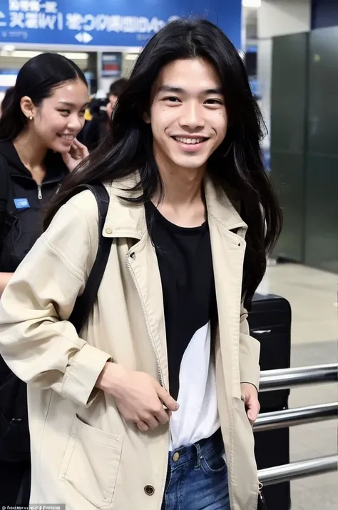 An Indonesian Malaysian boy has a big smile on his face, while standing at the airport and being photographed by paparazzi. He has a modern clothing style, black hair, world, yes, he is also well styled, he has dimples, he is tall and waves ￼