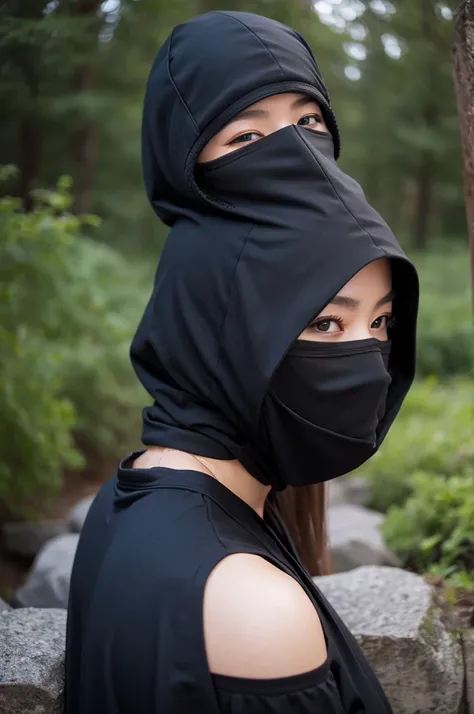 A female ninja wearing a black hood