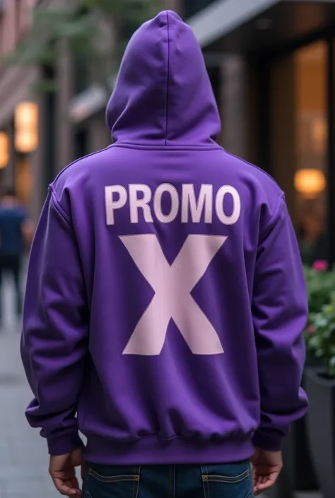 A purple hoodie , that says on the back “PROMO X” and on the front 5to B 