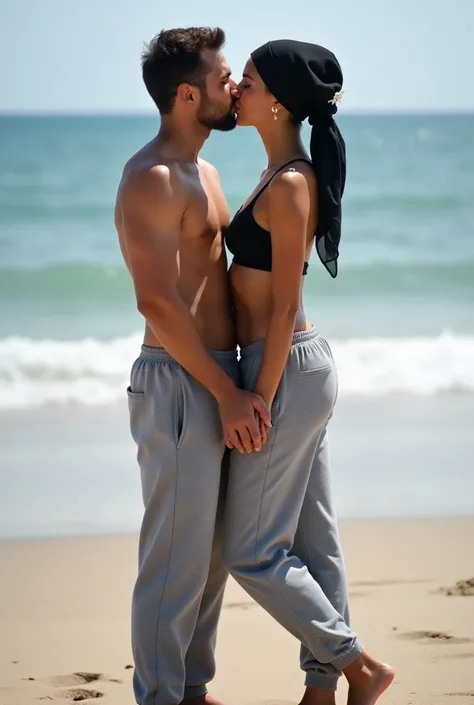 with black headscarf, barefoot, grey sweatpants, braless woman,      kissing with boyfriend on the beach