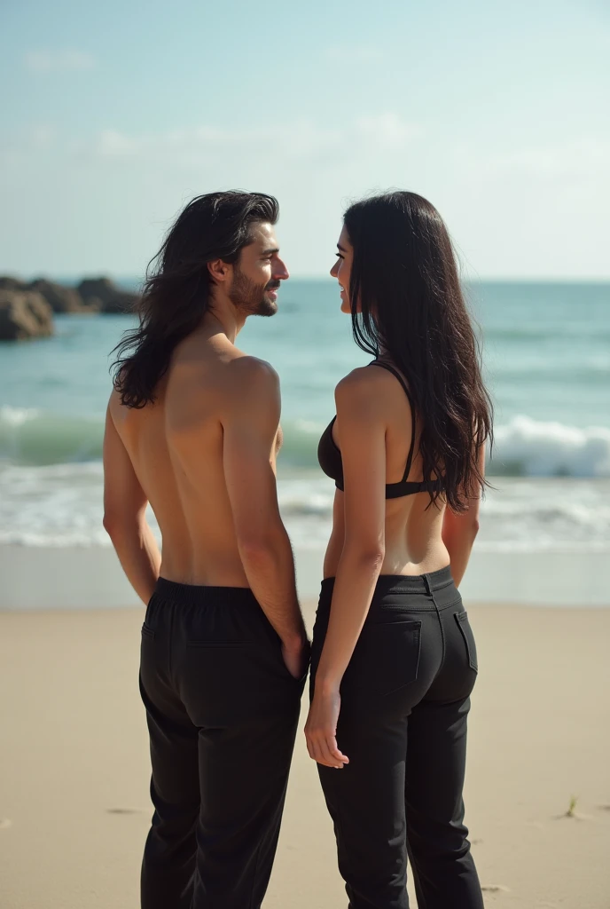 barefoot, black hair,black pants, braless woman chatting with male friends on the beach