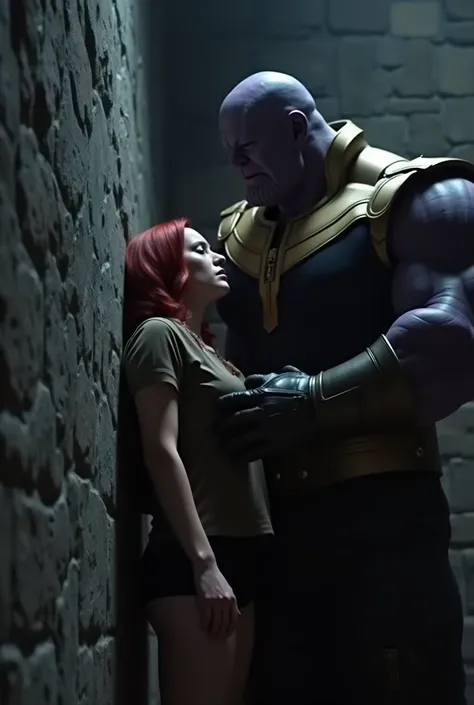 In a dimly lit room, Thanos, a large and imposing figure with a grim expression, is standing close to Natasha Romanov, a young woman with red hair. Natasha is leaning against a cold stone wall, her shirt slightly lifted to expose her bare abdomen. Thanos h...