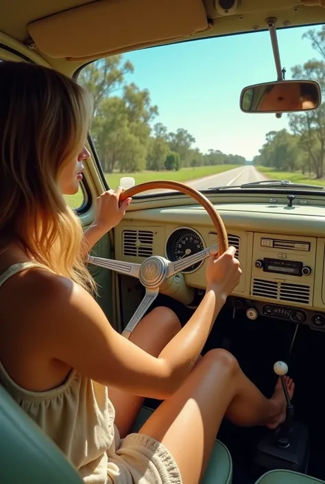 beautiful australian woman driving an old VW Beetle with her beautiful feet seen from behinds the car pedals