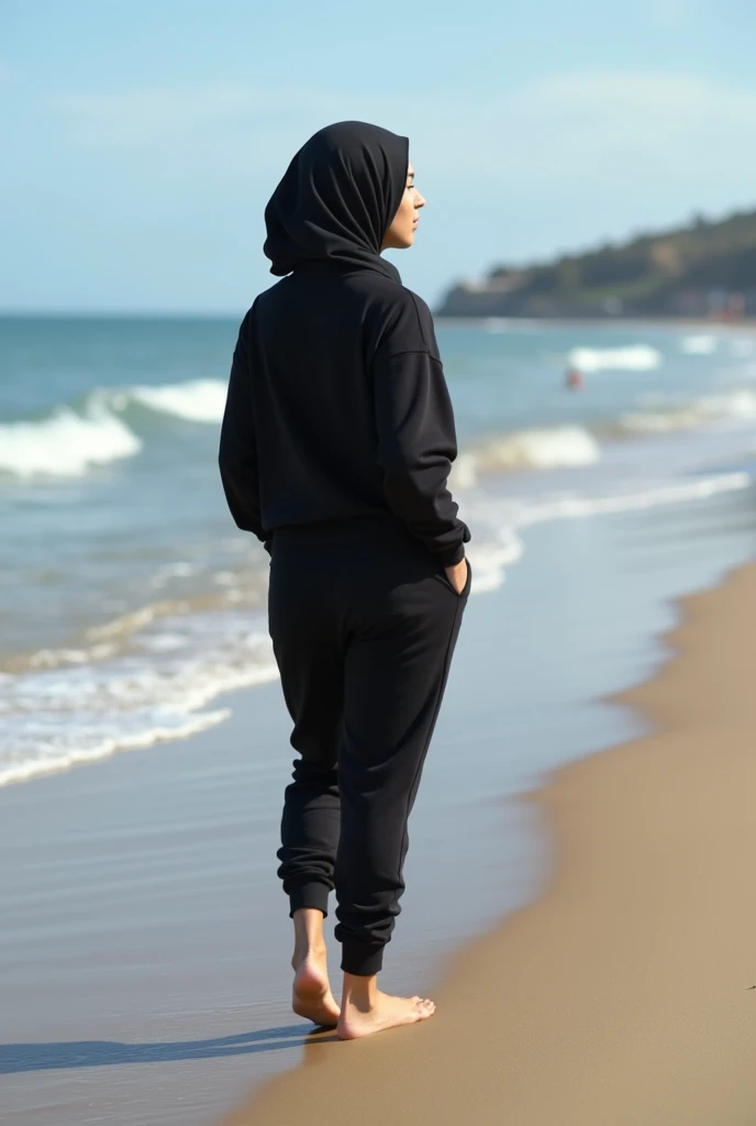 Black headscarf on the beach, black sweatpants, Barefoot woman. Men who touch women