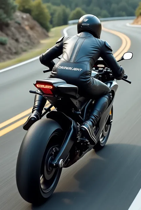 a motorcyclist on a sports bike, with the name Darwin Ch on the back