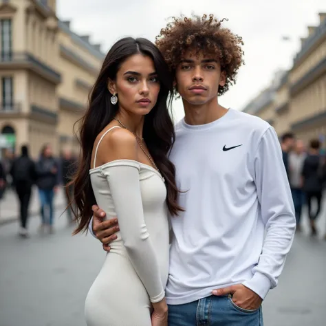 Un couple. La fille a les cheveux longs et très lisse cheveux noirs au yeux verts, she is wearing a long white tight-fitting dress, elle a des créoles comme boucles oreille, she is heavily made up. The boy has brown curly hair, il a les yeux marrons il por...