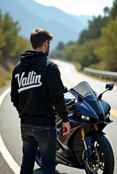 Someone focused on a Yamaha r1 that on the back of his sweatshirt says vallin