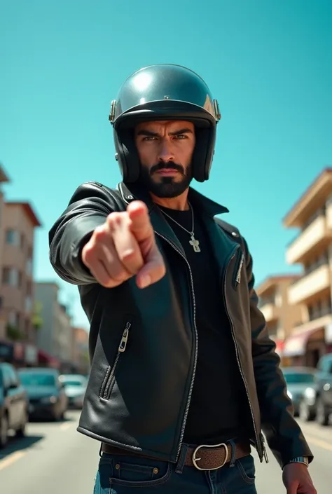 horizontal image of a standing biker, wearing a helmet with an open visor, where you can see his face with a serious expression, he is in front, showing the index finger hand pointing down. in the background there is a street with several cars and building...